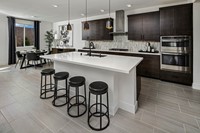 61516_Encantada at Vineyard Terrace_Evergreen_Evergreen Model Interior Of Kitchen _ Dining Area