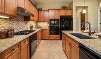 collage-kitchen-countertops-cabinetry-four-seasons-at-terra-lago-indio-ca