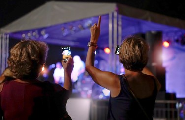 7 58630_Older Women at Country Music COncert GettyImages-1031557340